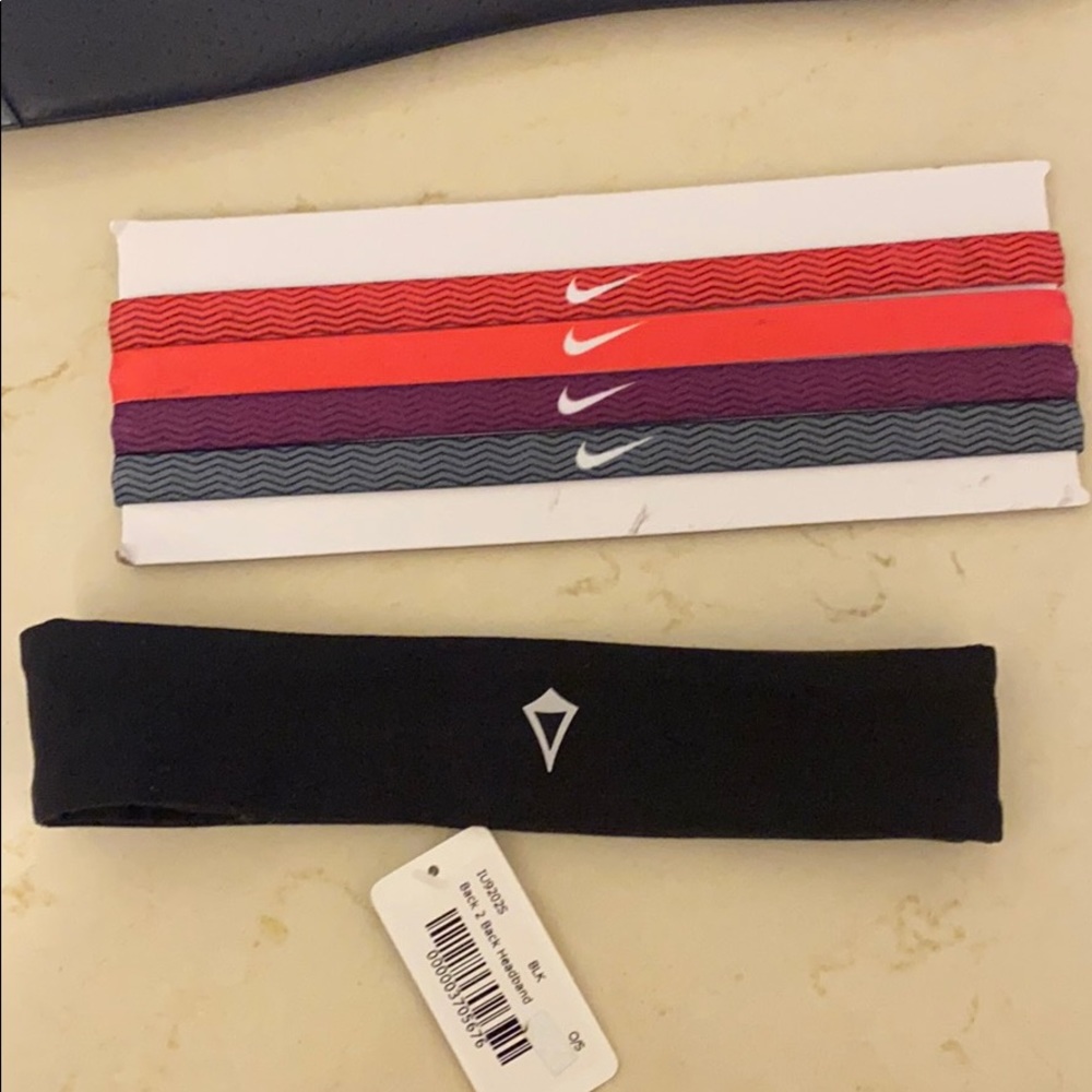 Never worn Nike and ivivva athletic headbands